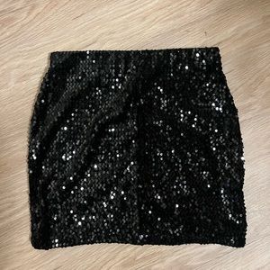 Black sequin miniskirt